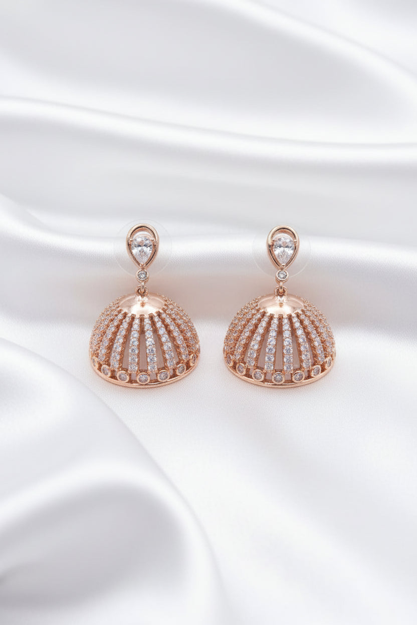 Rose Gold Plated Dome Jhumka Earrings With Pear Cut CZ Stones