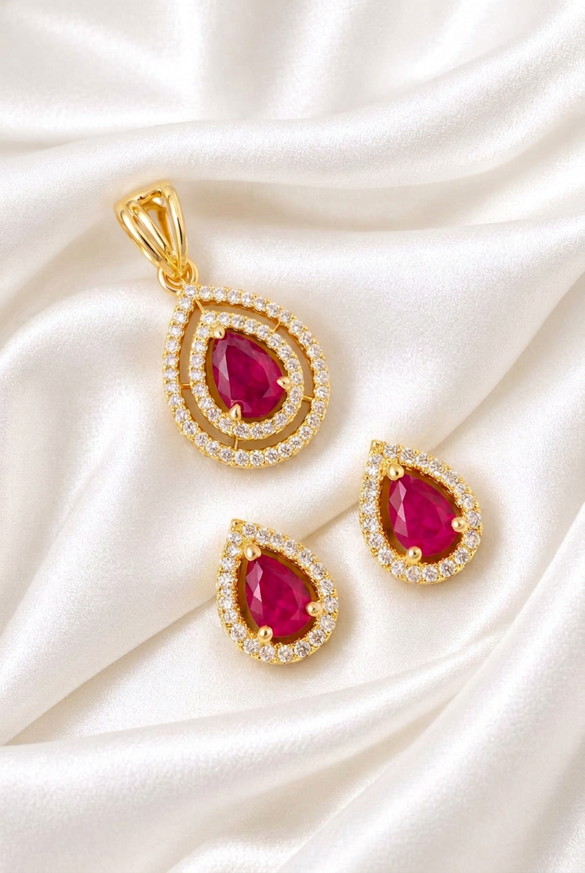 Exquisite Pear-Cut Ruby & Zirconia Double-Halo Pendant and Matching Push-Back Earrings Set in Gold Finish