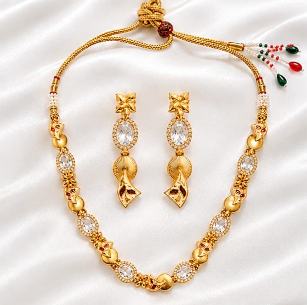 Traditional Gold Tone Necklace Set with White Stone Floral Design and Matching Drop Earrings