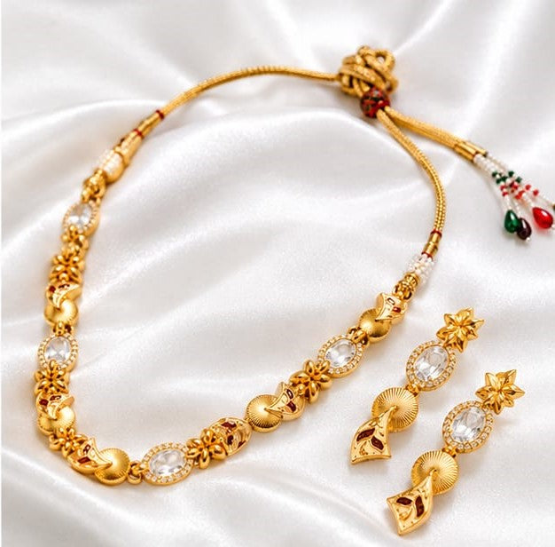 Traditional Gold Tone Necklace Set with White Stone Floral Design and Matching Drop Earrings