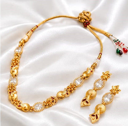 Traditional Gold Tone Necklace Set with White Stone Floral Design and Matching Drop Earrings
