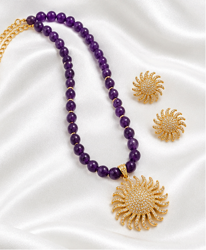 Purple Beaded Necklace Set with Gold-Tone Sunburst Pendant and Matching Stud Earrings