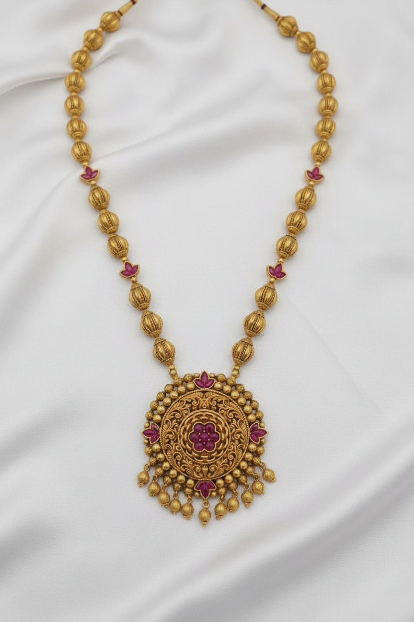 Traditional Gold-Tone Temple Necklace Set with Matching Jhumka Earrings – Magenta Stone Design