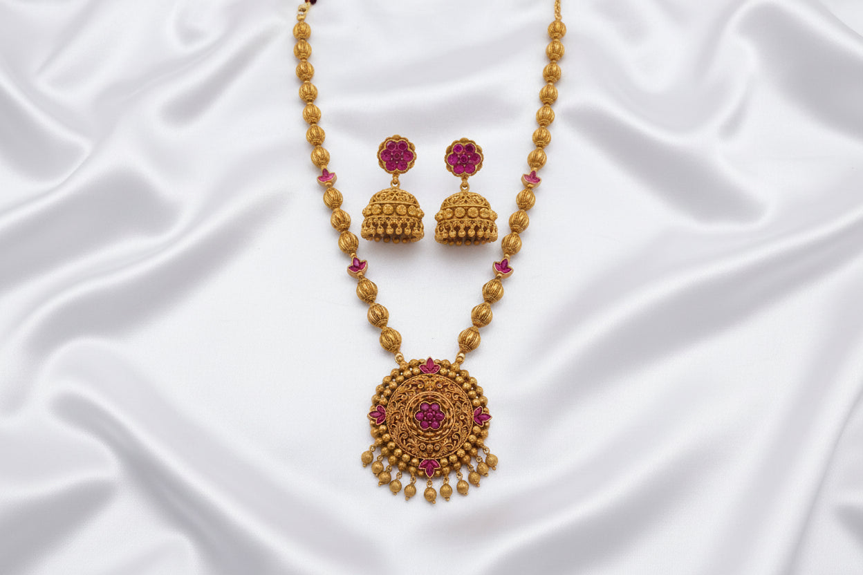 Traditional Gold-Tone Temple Necklace Set with Matching Jhumka Earrings – Magenta Stone Design