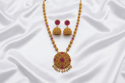 Traditional Gold-Tone Temple Necklace Set with Matching Jhumka Earrings – Magenta Stone Design