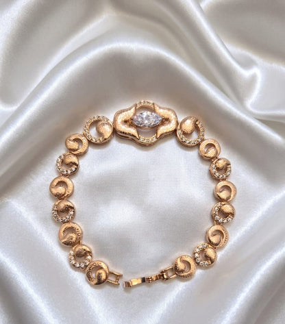 Elegant Gold-Tone CZ Stone Bracelet with Floral Centrepiece