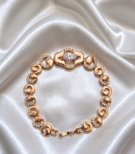 Elegant Gold-Tone CZ Stone Bracelet with Floral Centrepiece
