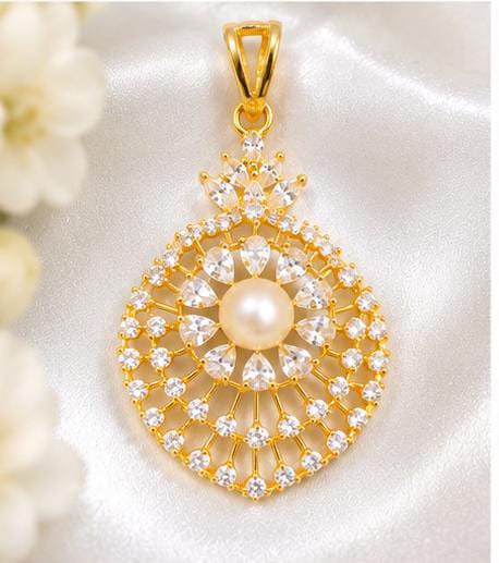Gold Plated Pearl Pendant and Earring Set with American Diamond Stones