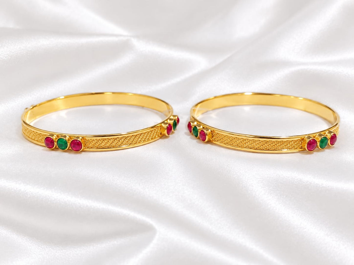 Minimalist Traditional Gold Finish Bangle Pair | Bezel-Set Ruby & Emerald Stones with Braided Texture