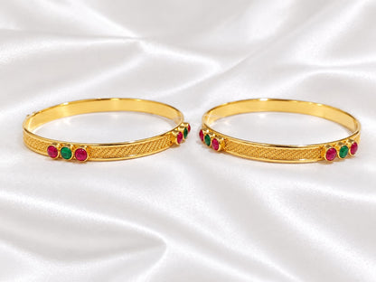 Minimalist Traditional Gold Finish Bangle Pair | Bezel-Set Ruby & Emerald Stones with Braided Texture