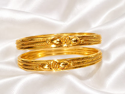 Classic Textured Gold Finish Fixed Bangles with Floral Center Cluster (Set of 2)