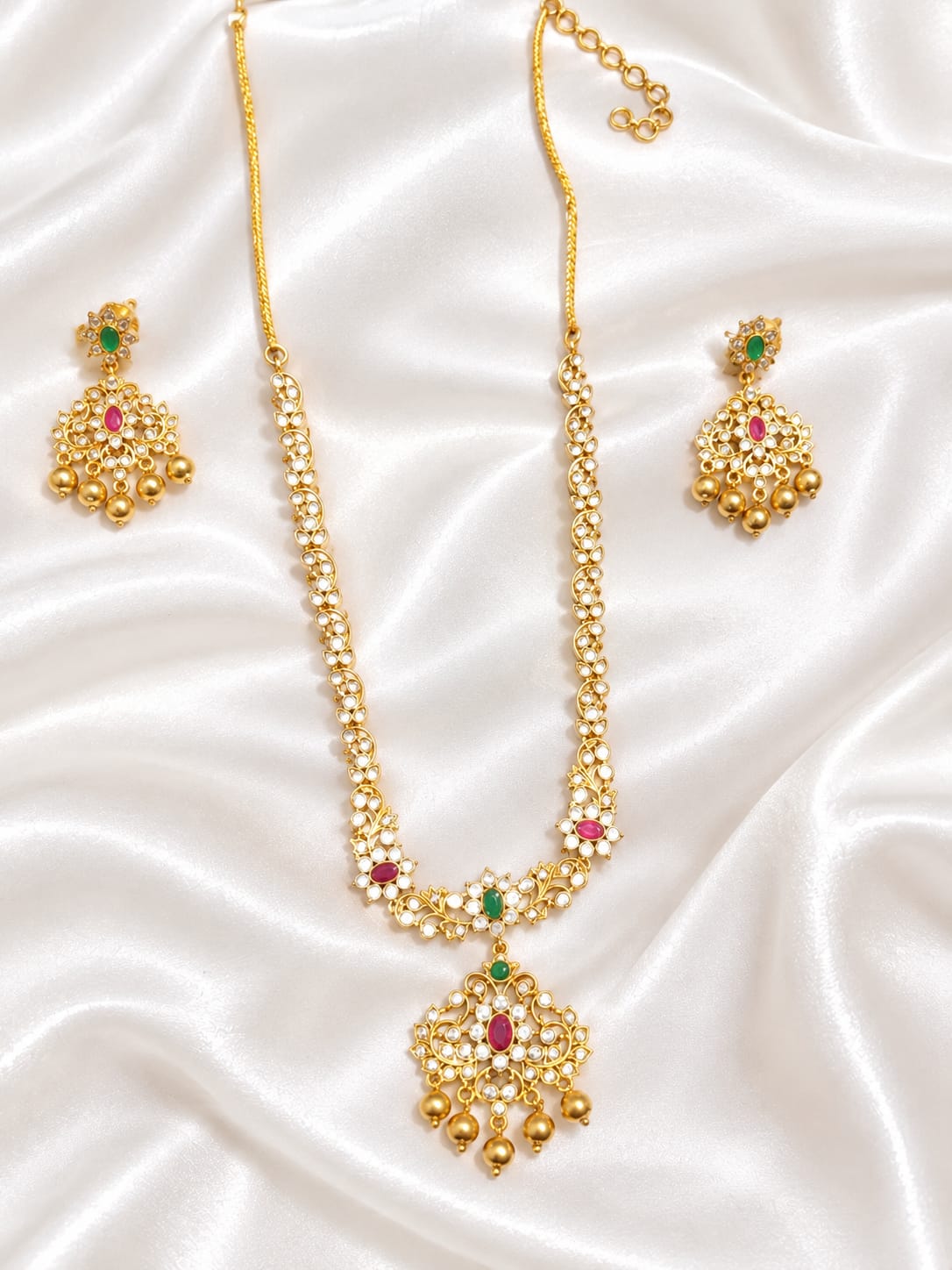 Elegant Matte Gold Floral Unki Pattern Necklace with Ruby & Emerald Kemp Accents