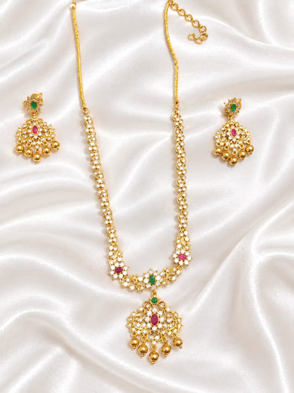 Elegant Matte Gold Floral Unki Pattern Necklace with Ruby & Emerald Kemp Accents