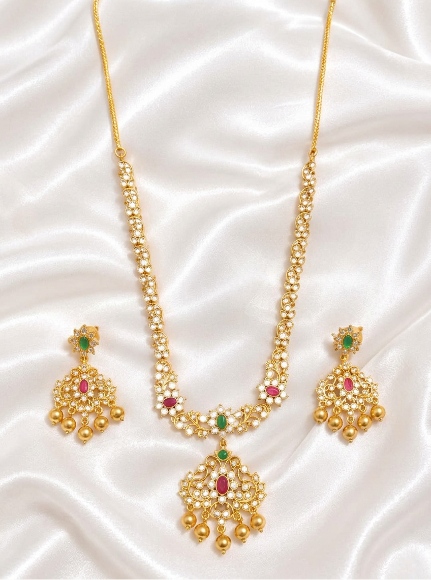 Elegant Matte Gold Floral Unki Pattern Necklace with Ruby & Emerald Kemp Accents