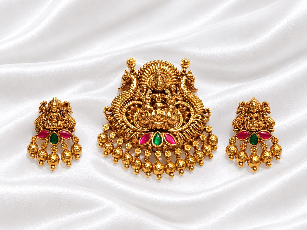 Antique Gold Plated Goddess Lakshmi Temple Pendant Set with Peacock Motifs & Ruby-Emerald Stones