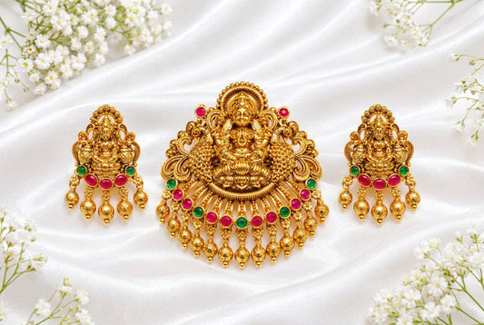 Traditional Gold Tone Lakshmi Temple Pendant Set with Pink & Green Stone