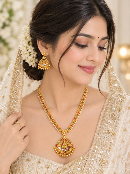 Gold-Plated Temple Lakshmi Long Haram Necklace Set with Ruby, Emerald & CZ Stones and Matching Drop Earrings