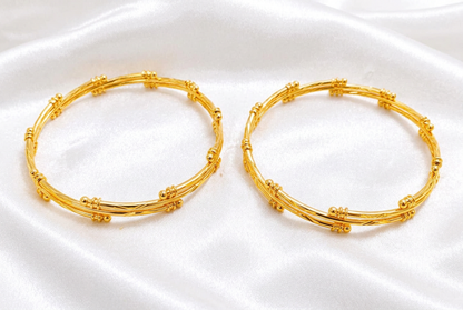 Gold Plated Multi-Strand Wire Bangle Set with Beaded Clasp Accents