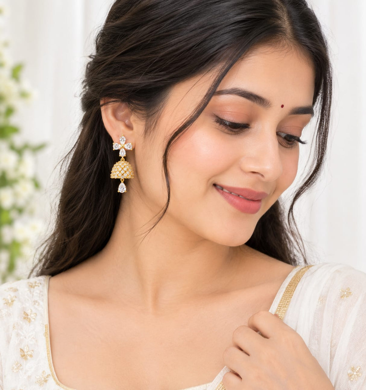 Gold-Plated CZ Floral Studded Jhumka Earrings with Pear-Cut Stone Drops