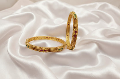 Antique Gold Plated Designer Bangle with Ruby & Emerald Stone Detailing