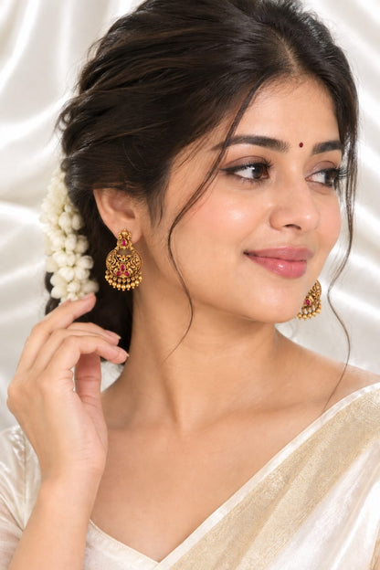 Antique Gold Temple Peacock Jhumka Earrings with Ruby & Green Stones
