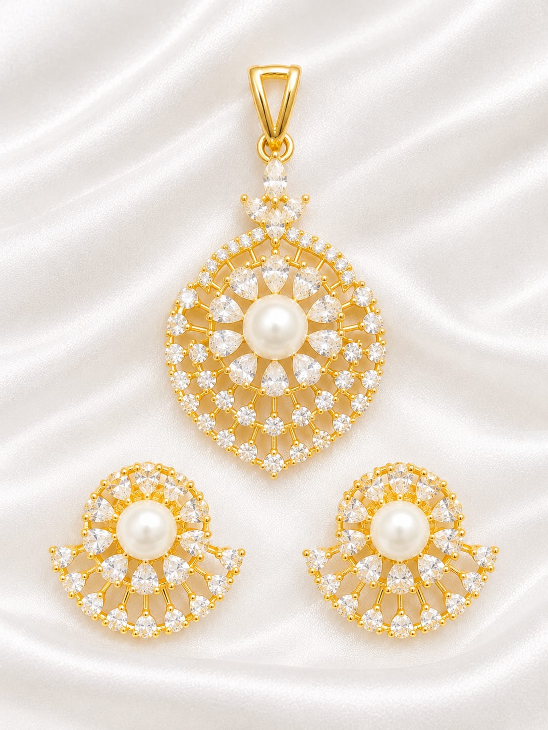 Gold Plated Pearl Pendant and Earring Set with American Diamond Stones
