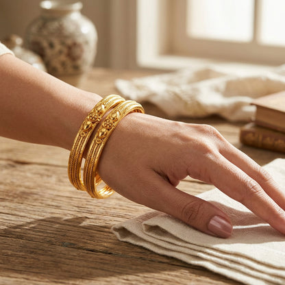 Classic Textured Gold Finish Fixed Bangles with Floral Center Cluster (Set of 2)